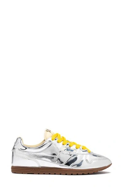 Autry Front Lace Sneakers In Bright Yellow And Shiny Silver In Multi