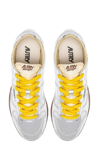 Autry Front Lace Sneakers In Bright Yellow And Shiny Silver In Multi