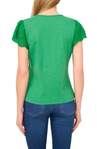 Cece Eyelet Flutter Sleeve T-shirt In Green