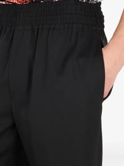 Roberto Cavalli Elasticated-waist Virgin-wool Trousers In Black