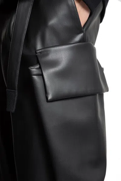 Sacai Faux Leather Pants In Black