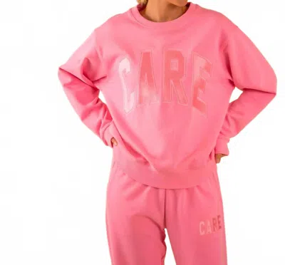 Care Tucker 90's Baggy Care Crewneck Sweatshirt In Pink In Pink