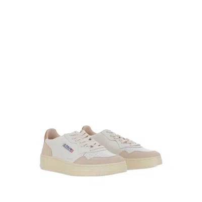 Autry Low-top Sneakers With Suede Inserts And Contrasting Heel In White
