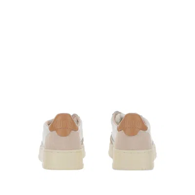 Autry Low-top Sneakers With Suede Inserts And Contrasting Heel In White