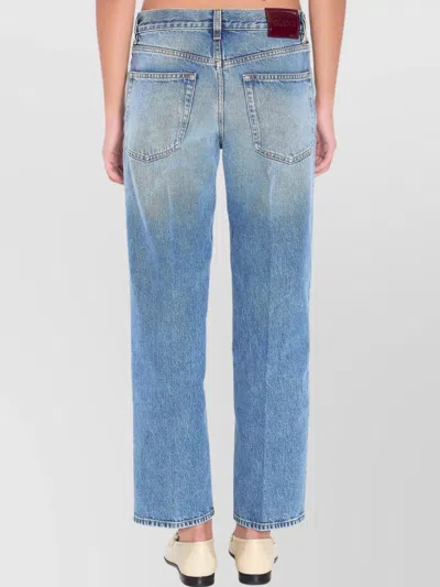 Gucci Blue Jeans With Logo Patch On The Rear And Faded Effect In Denim Woman