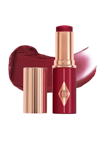 Charlotte Tilbury Unreal Lip + Cheek Glow Blush Stick With Hyaluronic Acid Berry Glow 0.31 Oz/9 ml In Purple