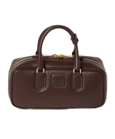 Miu Miu Soft Padded Shoulder Bag And Handles In Brown
