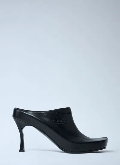 Balenciaga Debossed Logo Heeled Mules In Black