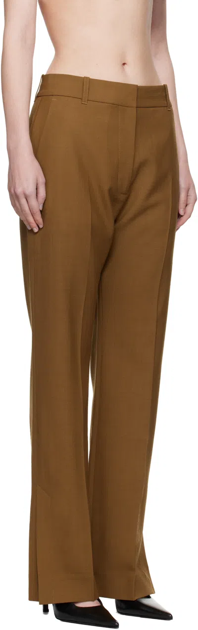 Studio Nicholson Mitra Split-hem Trousers In Brown