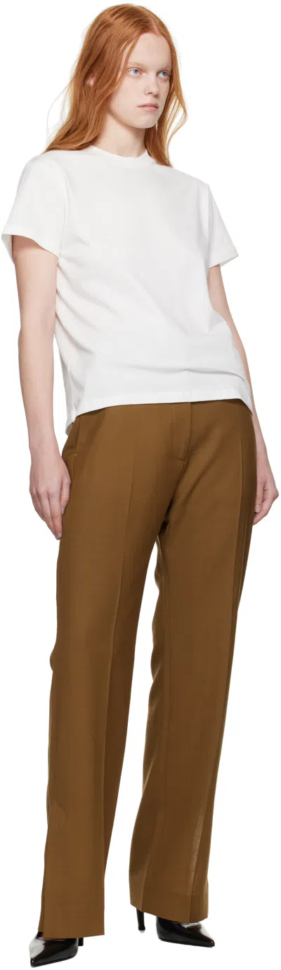 Studio Nicholson Mitra Split-hem Trousers In Brown