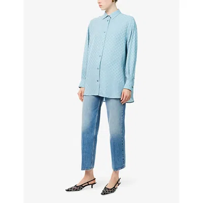 Gucci Blue Jeans With Logo Patch On The Rear And Faded Effect In Denim Woman