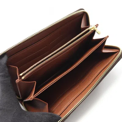 Pre-owned Louis Vuitton Monogram Brown Coated Canvas Monogram Pvc Long Wallet (bi-fold) ()