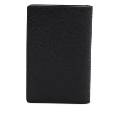 Tod's Textured Finish Wallets For A Sophisticated Look In Black