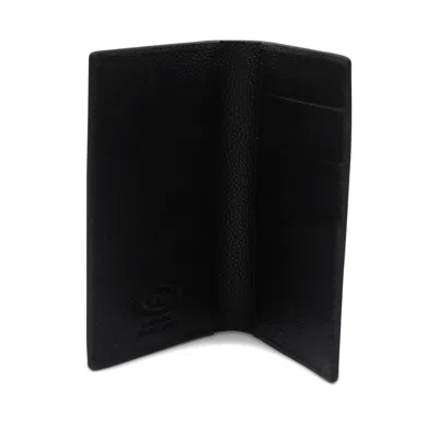 Tod's Textured Finish Wallets For A Sophisticated Look In Black