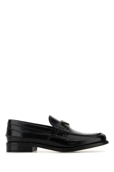 Prada Logo Patent Leather Loafers In Nero