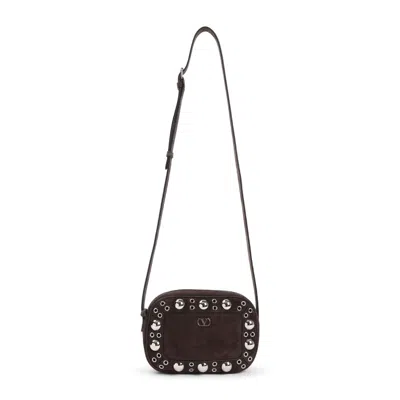 Valentino Garavani Dome-shaped Crossbody Bag With Metallic Eyelets And Adjustable Strap In Brown