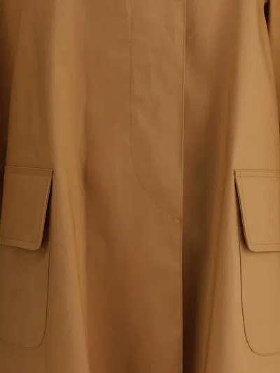 Prada Coats In Brown