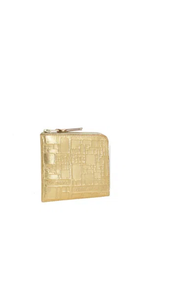 Comme Des Garçons Wallets In Gold