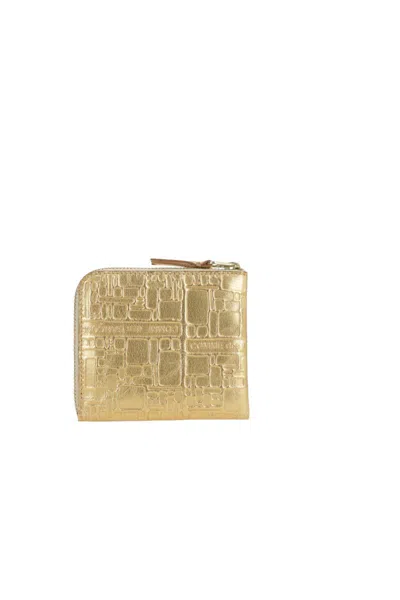 Comme Des Garçons Wallets In Gold