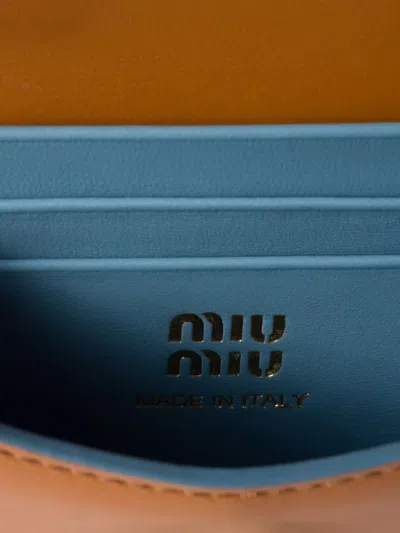 Miu Miu Leather Tassel Wallet In Brown