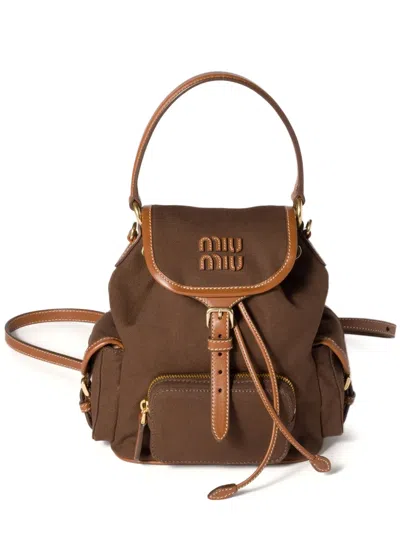 Miu Miu Leather-trimmed Canvas Backpack In Brown
