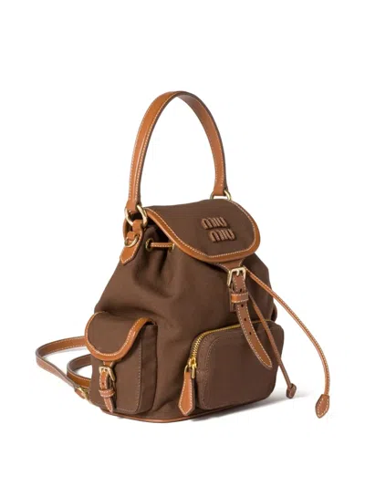 Miu Miu Leather-trimmed Canvas Backpack In Brown