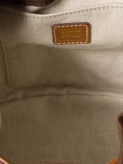 Miu Miu Leather-trimmed Canvas Backpack In Brown