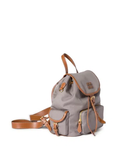 Miu Miu Leather-trimmed Flap Backpack In Gray