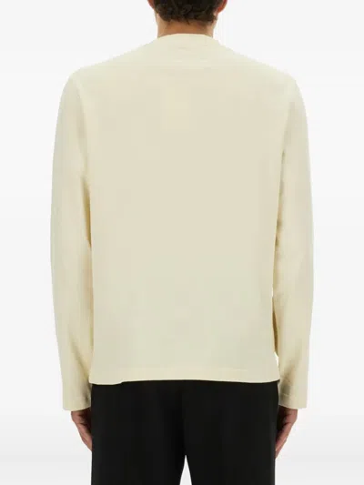 Jacquemus Long-sleeve Off-white Cotton T-shirt With Subtle Logo Patch In Neutral