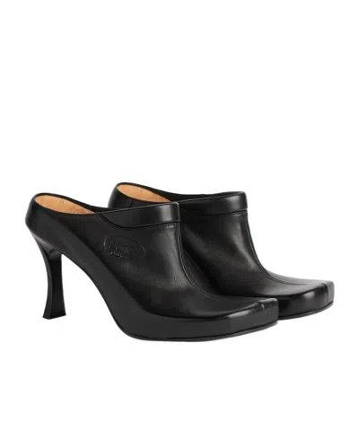 Balenciaga Debossed Logo Heeled Mules In Black