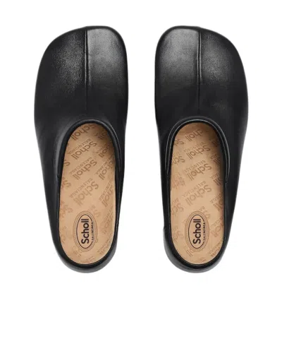 Balenciaga Debossed Logo Heeled Mules In Black