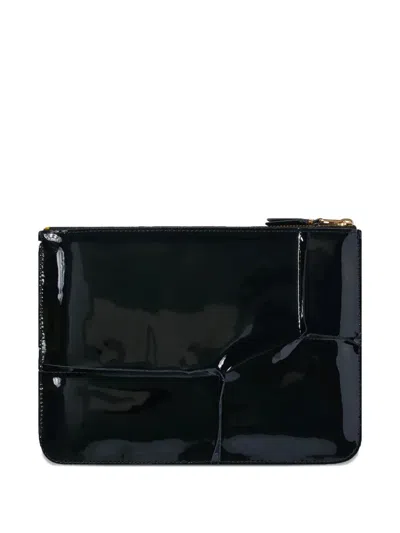 Comme Des Garçons Debossed-logo Wallet In Black