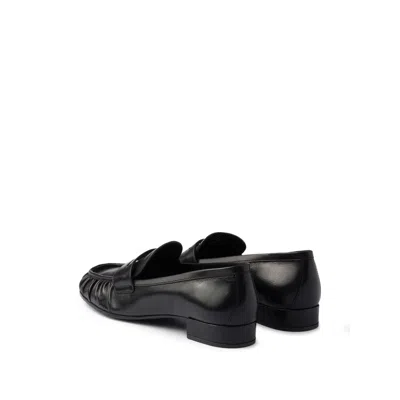 Prada Rounded Toe Loafers With Textured Detailing And Low Block Heel In Black