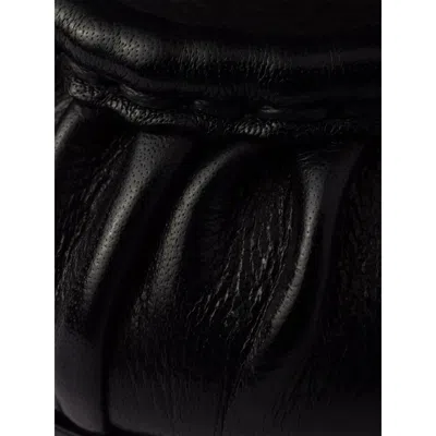 Prada Rounded Toe Loafers With Textured Detailing And Low Block Heel In Black