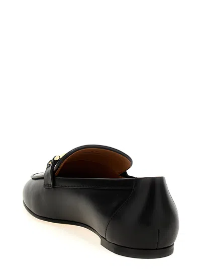 Tod's Leather Loafers With Subtle Gold Accent In Black