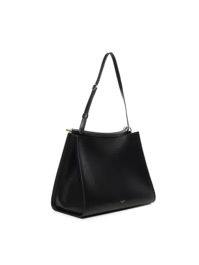 Alaïa Le Click Medium Curve Shoulder Bag In Glossy Leather In Black