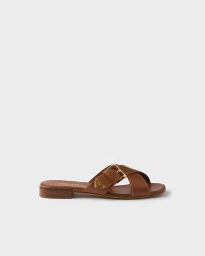 Prada Leather Crisscross Slides With Buckle Shoes In Brown
