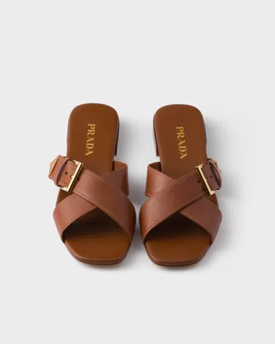 Prada Leather Crisscross Slides With Buckle Shoes In Brown