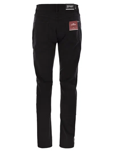 7 For All Mankind Slimmy Tapered Skinny Medium Waisted Jeans In Black