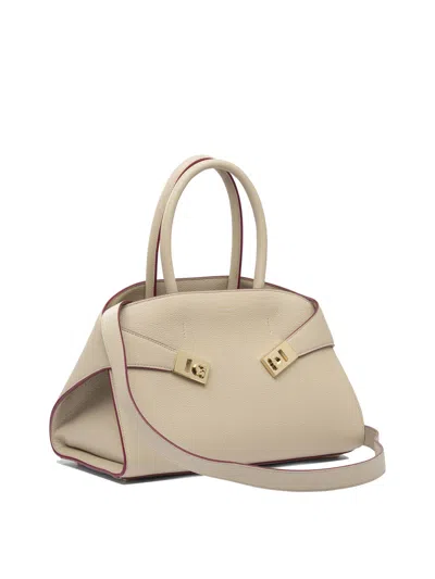 Ferragamo Medium Hug Leather Top Handle Bag In Neutral