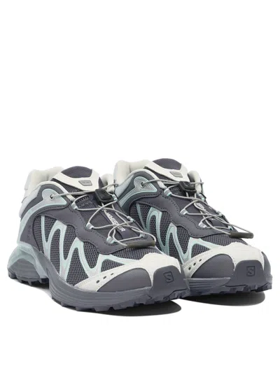 Salomon Slip-on Sneakers With Rubber Sole And Mesh Panels In Gray