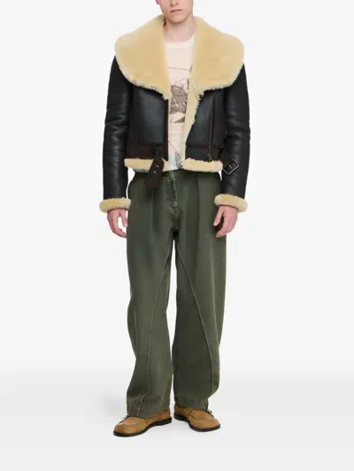 Jw Anderson Twisted Seam Trousers Dark Green In Green