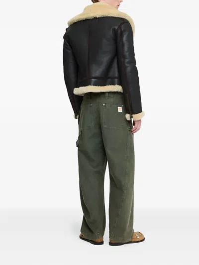 Jw Anderson Twisted Seam Trousers Dark Green In Green
