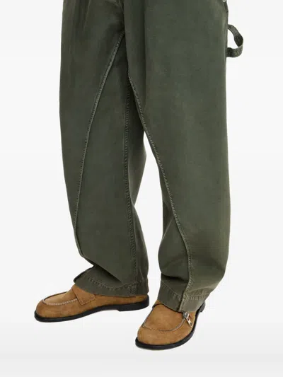 Jw Anderson Twisted Seam Trousers Dark Green In Green
