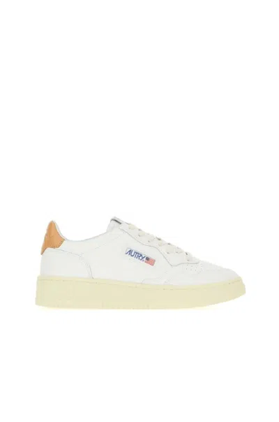 Autry Minimalist White Leather Low-top Sneakers With Perforated Detailing In White