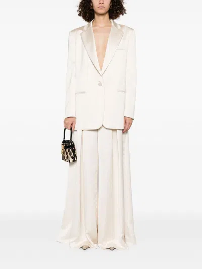 The Andamane Gabardine Trousers With Back Pockets And Pleated Design In Neutral