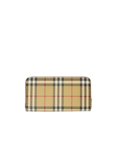 Burberry Checked Zipped Leather Wallet In Brown