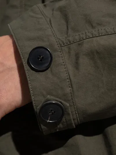 Givenchy Button-fastening Pocket Coat In Green