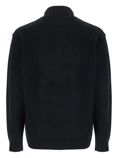 C.p. Company Black Jacket With High Neck And Logo Plaque On The Sleeve In Wool Blend Man In Black