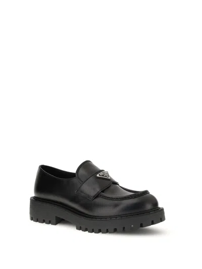 Prada Monolith Leather Loafers In Black